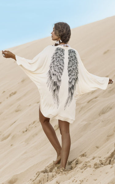 Poncho ligero boho con alas de ángel en espalda